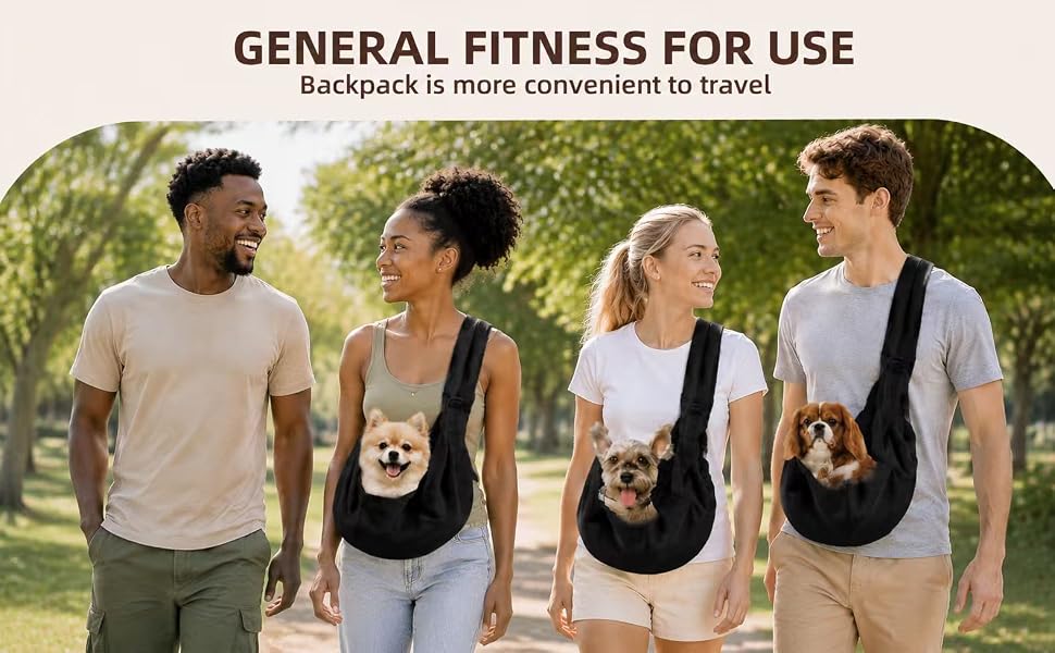 Dog owners walking with small dogs in black puppy slings