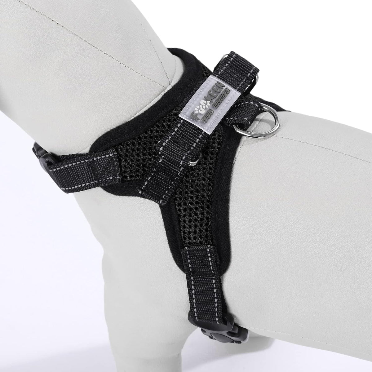 Black air mesh dog harness with reflective trim and back D-ring