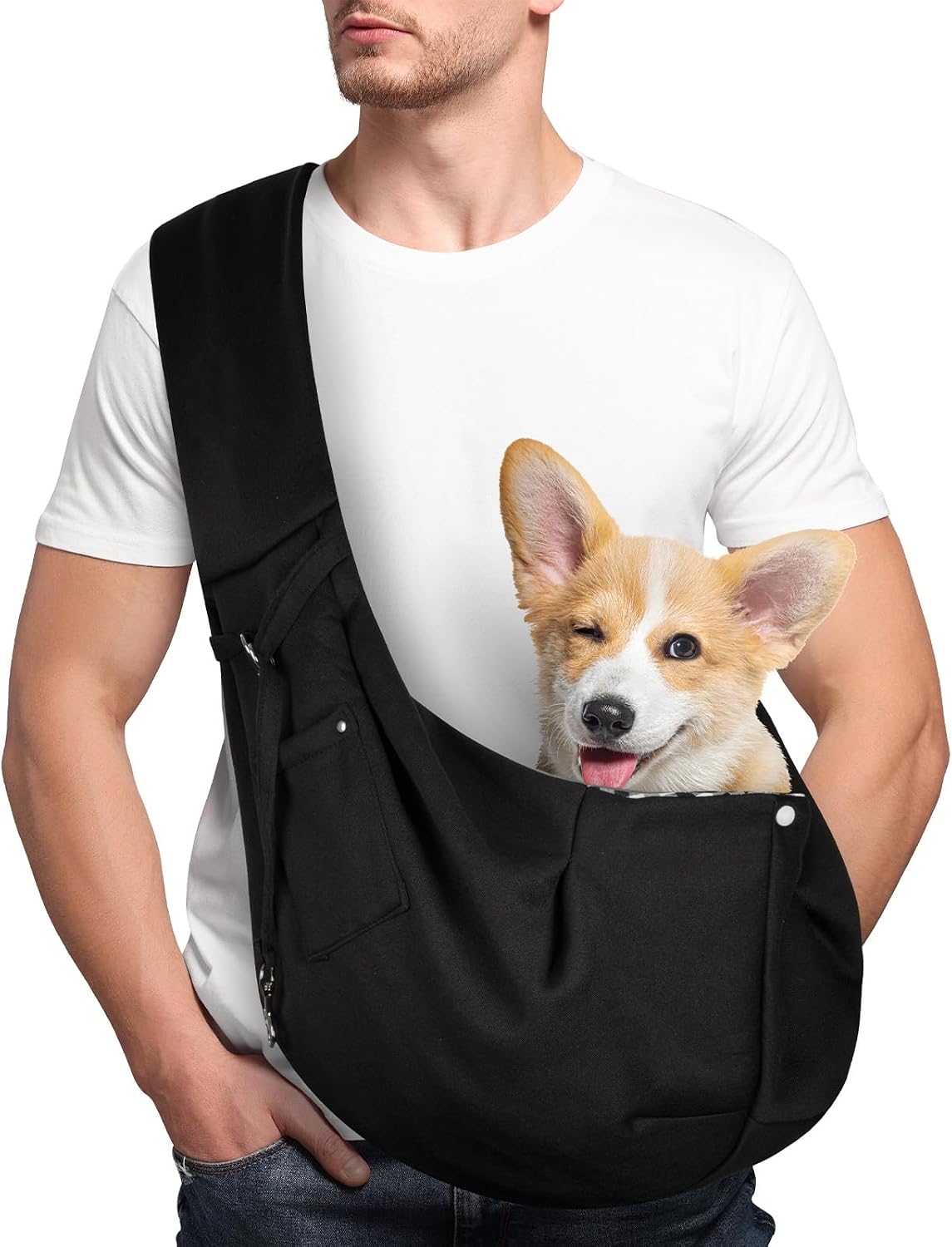 Black adjustable dog sling carrier with a small dog sitting inside