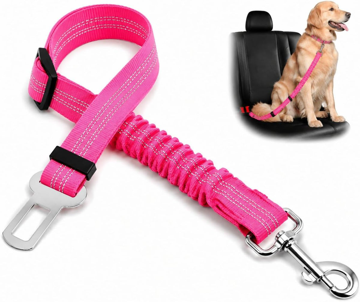 Pink adjustable dog car seat belt with elastic bungee, shown with dog secured on rear seat
