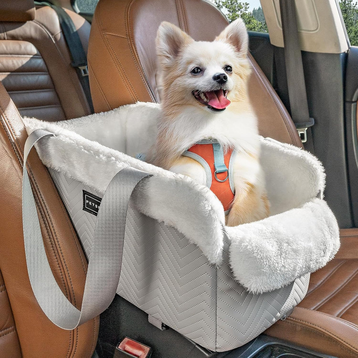 Grey leather centre console dog car seat with small dog
