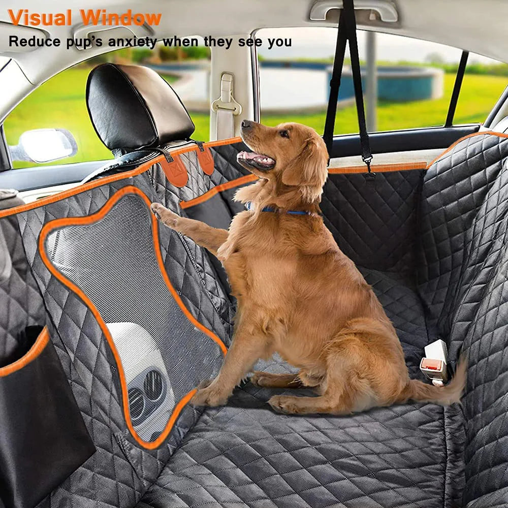 Black waterproof dog car hammock with mesh window fitted on a back seat with a large dog